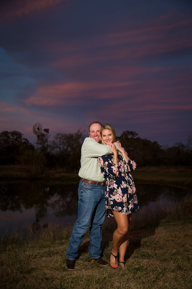 Couple hug at sunset in San Antonio engagement session