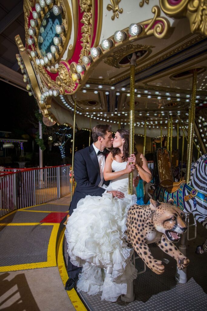 Ashley - Josh's wedding at Morgan's Wonderland on the carousel