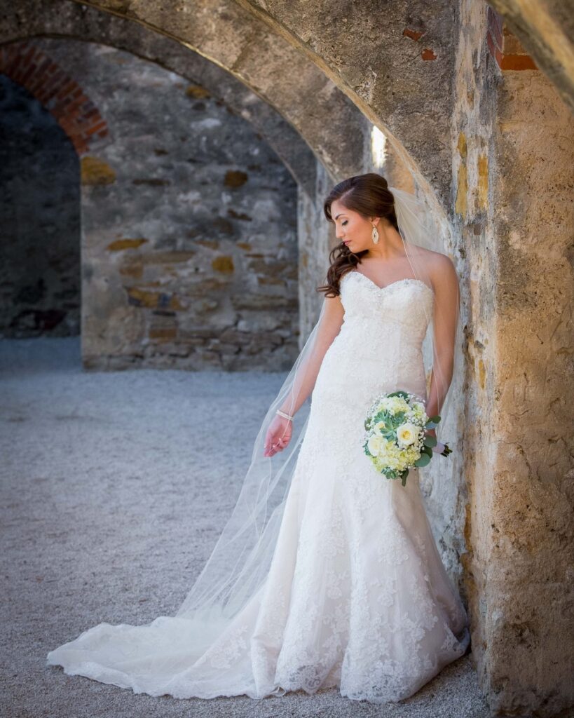 Alison Bridal at Mission san Jose in arch