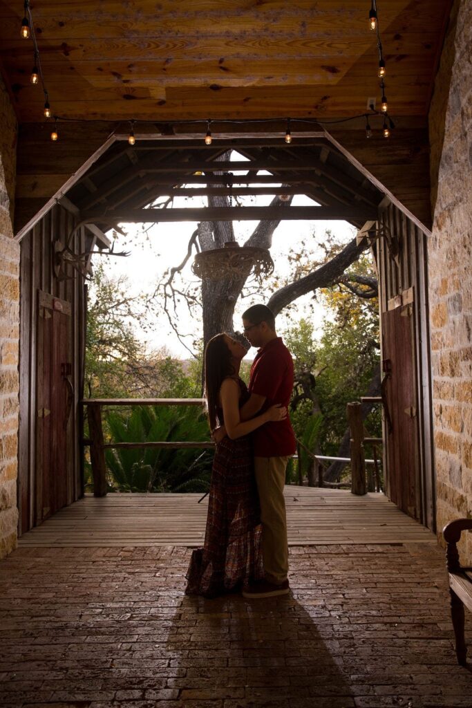 Aamber and Alex engagement session in Gruene Tx breezeway silhouette
