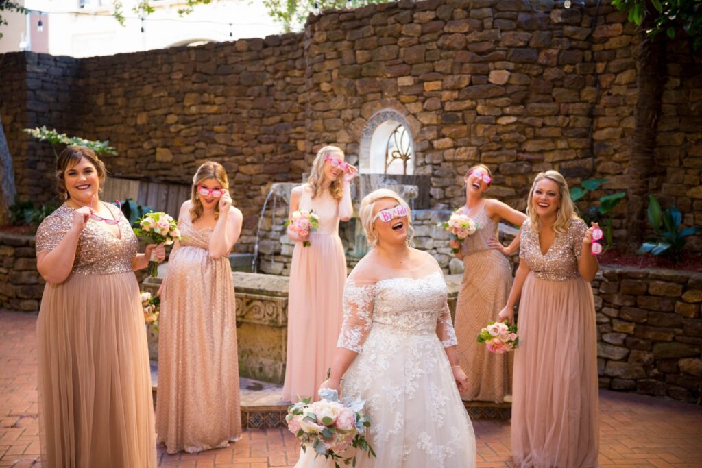 Crawford wedding Omni Del Mansion riverwalk bridesmaids laughing