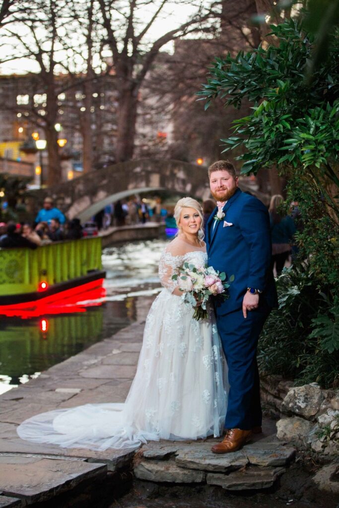 Crawford wedding Omni Del Mansion riverwalk portrait with boat