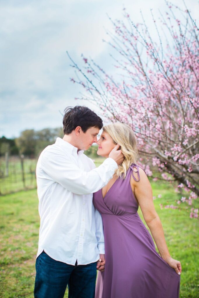 Michele Engagement session at Oak Valley Vineyards touching her face