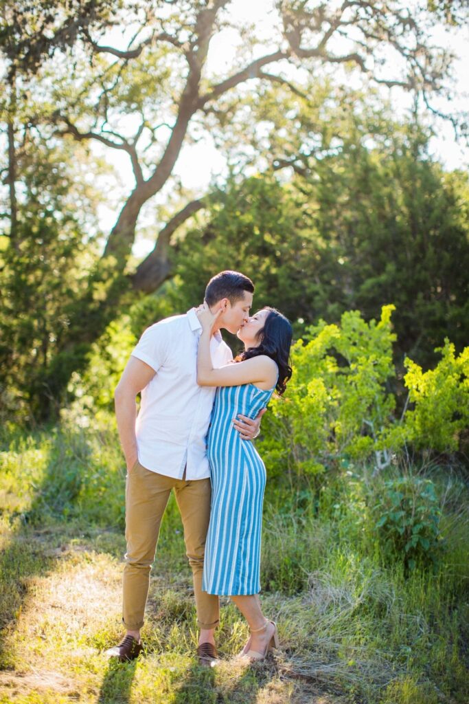 Jennifer and Nhon engagement New Braunfels kissing in the sun