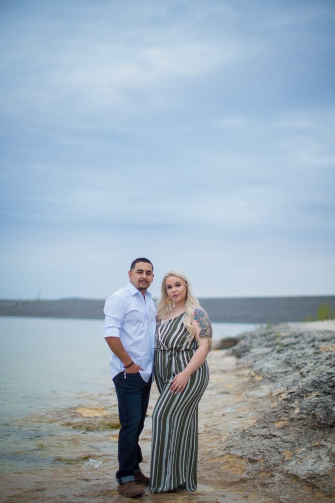 Katie & Gabe engagement session Canyon Lake dam behind on the water portrait