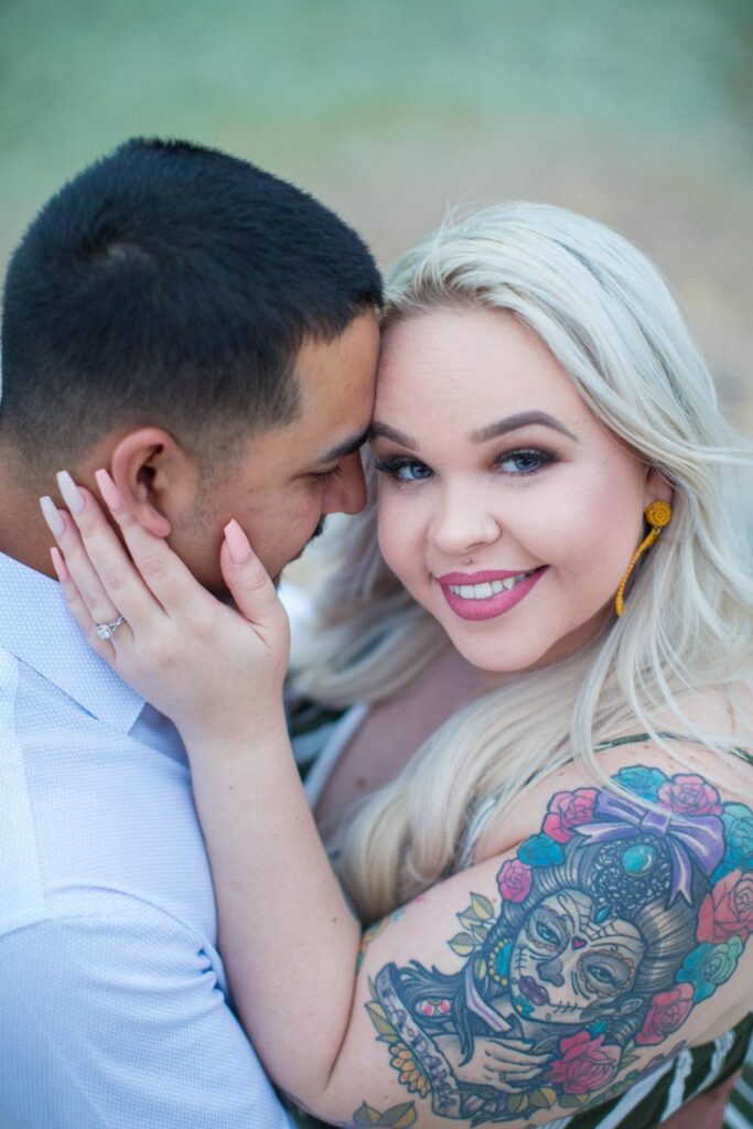 Katie & Gabe engagement session Canyon Lake dam on the water close up Katie looking