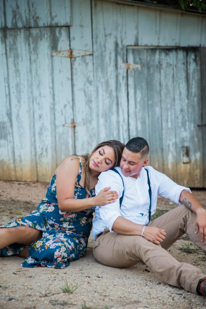 Ashley and Andy's engagement session Gruene white wall sitting