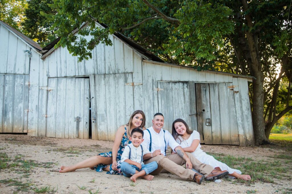 Ashley and Andy's engagement session Gruene white wall family