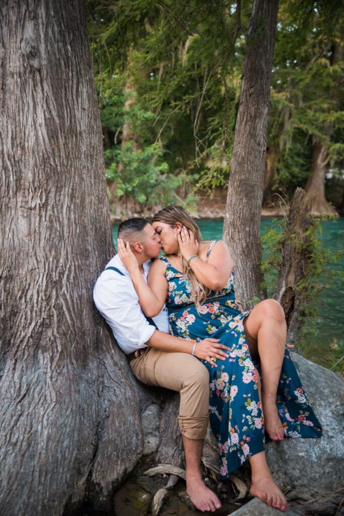 Ashley and Andy's engagement session Gruene river kiss