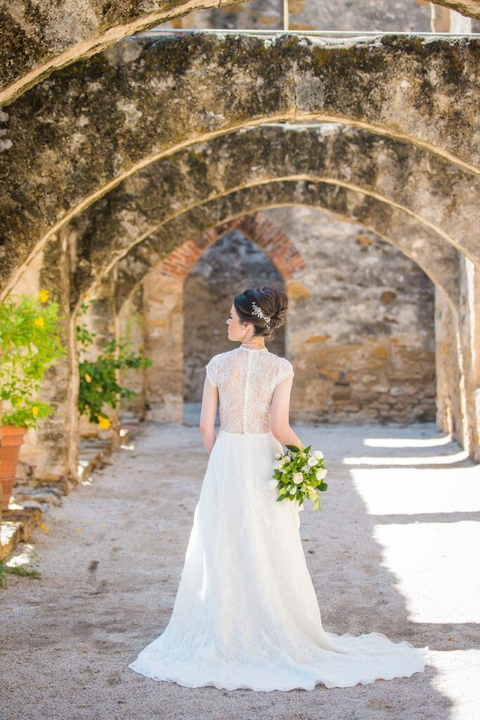 Aamber's bridal - mission San Jose back of her in the arches