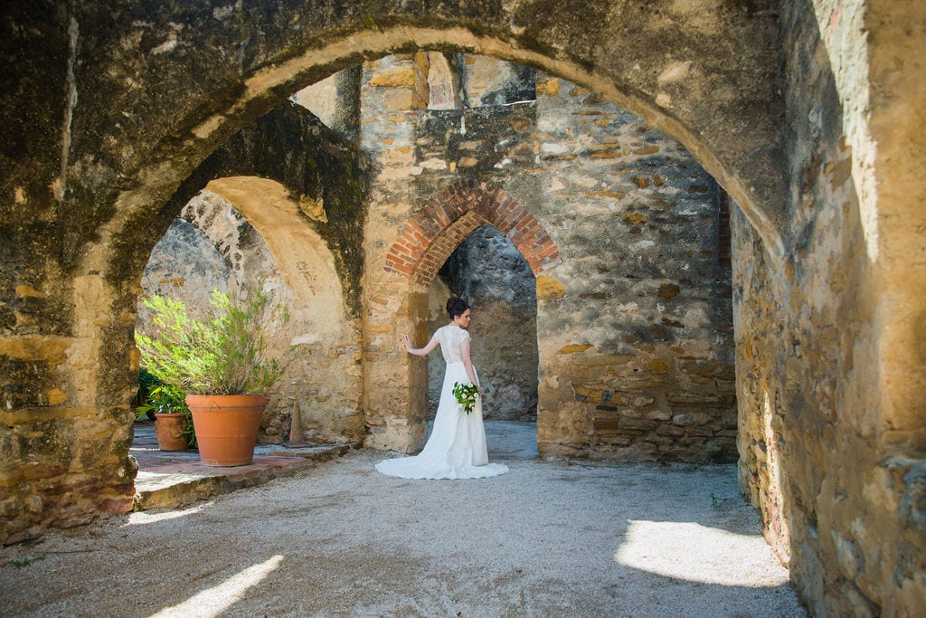Aamber's bridal - mission San Jose doorway under the arches