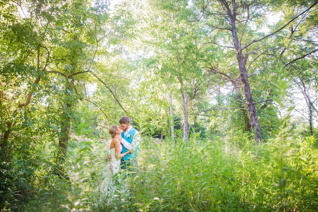 Courtney and Bearen's Wedding. A kiss in the trees