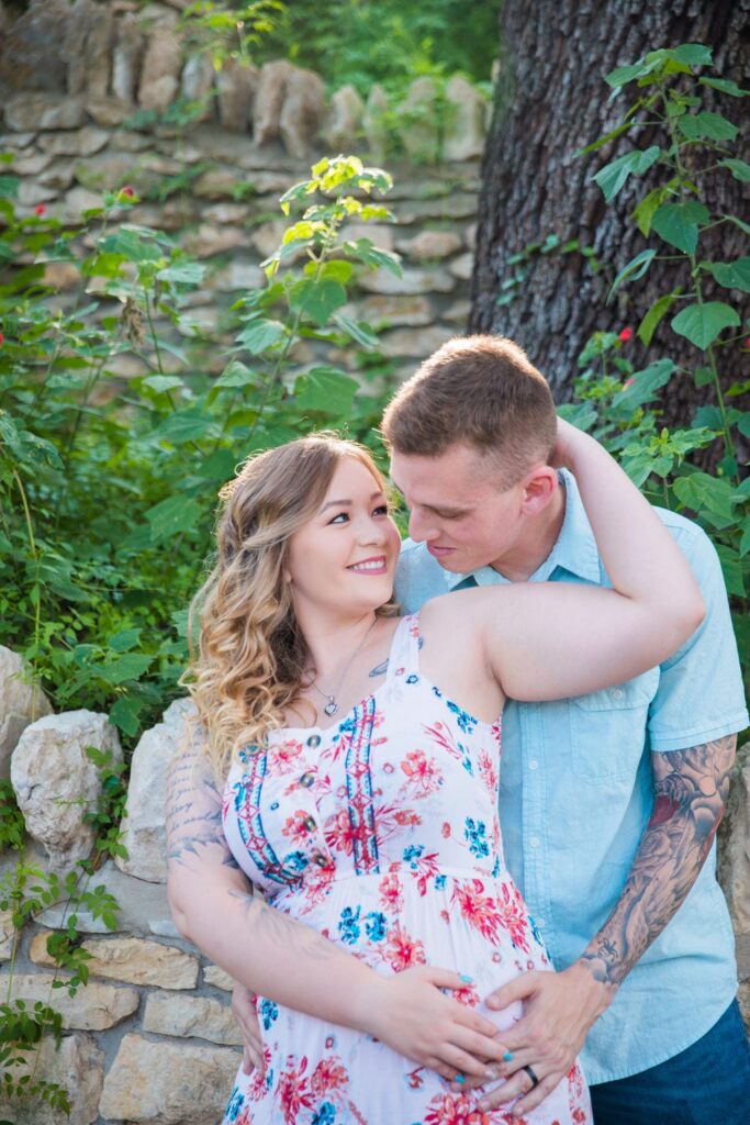Kristina and Brandon Engagement session Japanese tea gardens her holding his head