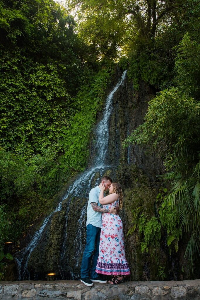 Kristina and Brandon Engagement session Japanese tea gardens waterfall kiss