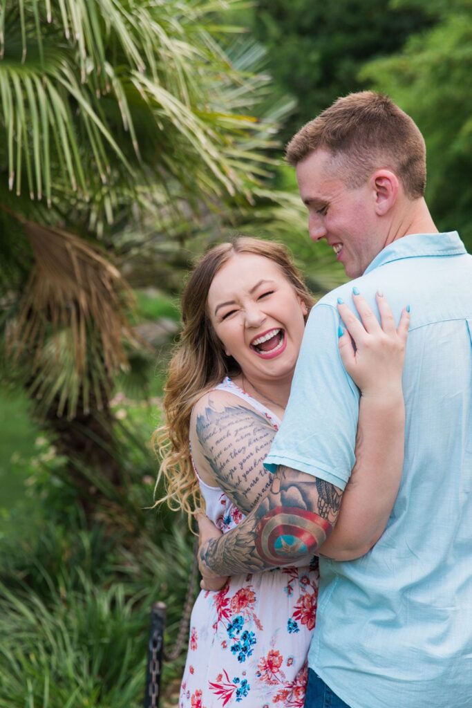 Kristina and Brandon Engagement session Japanese tea gardens her laughing