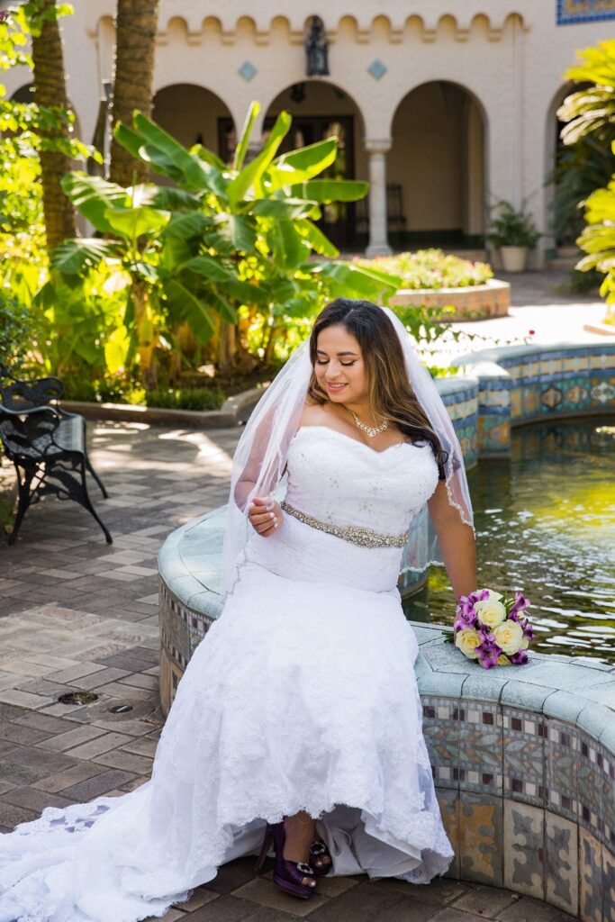 Linda's bridal session at the McNay seated by the fountain