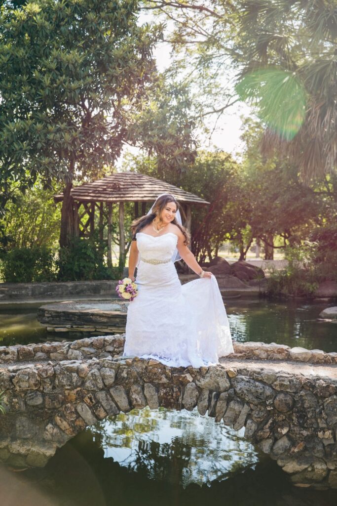 Linda's bridal session at the McNay on bridge with sunlight