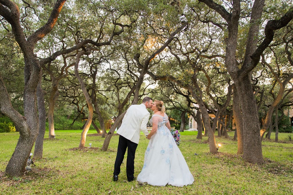 Lisa and Michael Wedding at the Veranda. kissing in the trees