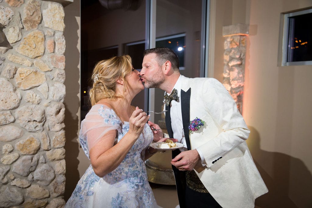 Lisa and Michael Wedding at the Veranda cake kiss
