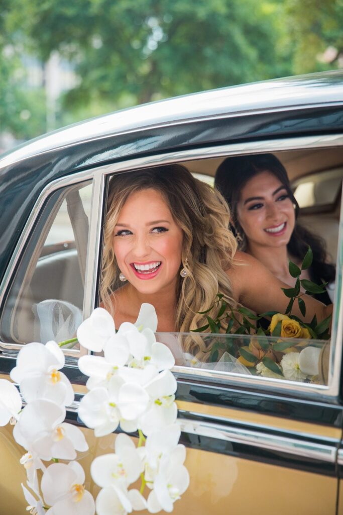 St Anthony Styled wedding the girls in the car