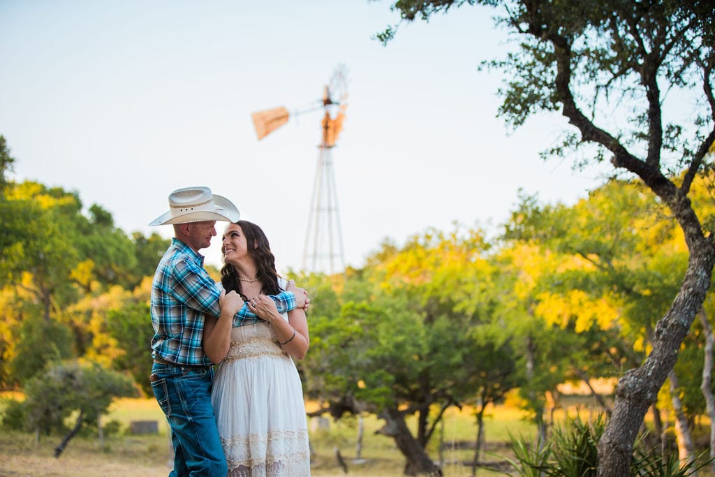 Tess -Lance Boerne, TX Engagement Portrait hug by windmill