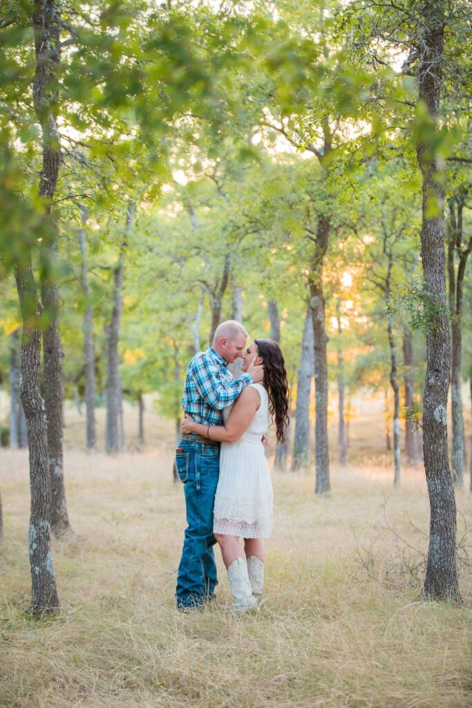 Tess -Lance Boerne, TX Engagement Portrait kiss in the trees