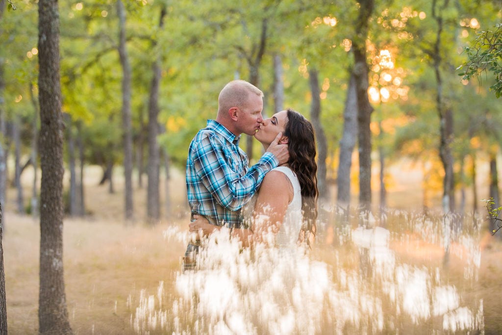 Tess -Lance Boerne, TX Engagement Portrait sun reflection kiss