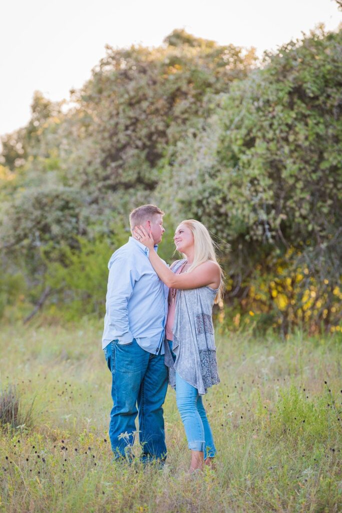 Whitney and Craig's ranch Engagement session tall grass