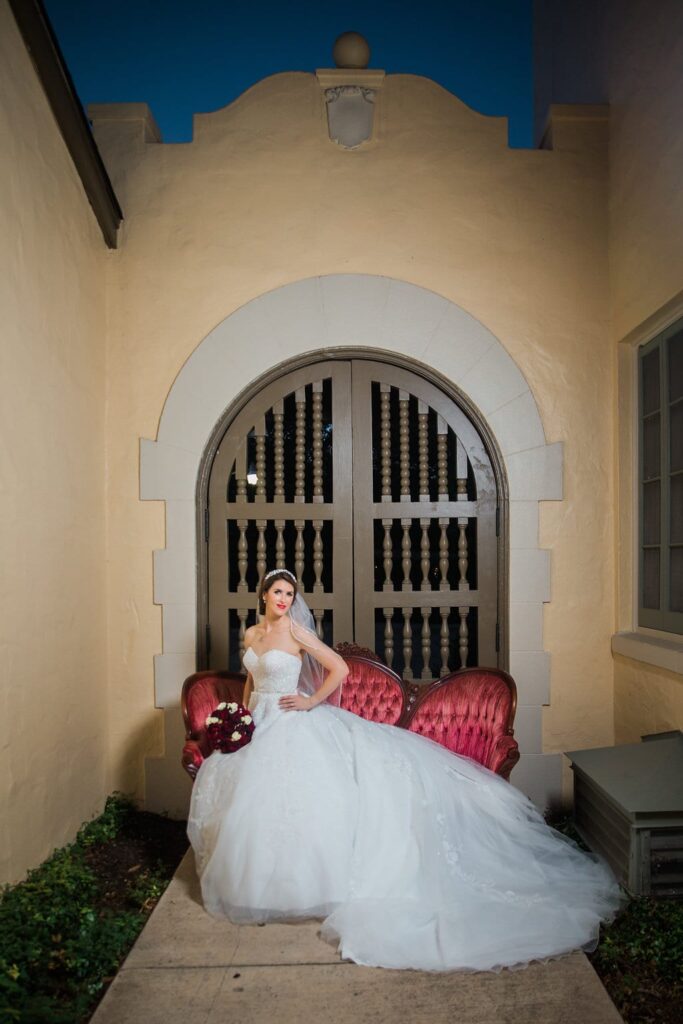 Laura's bridal at Landa Library gate bride on sofa