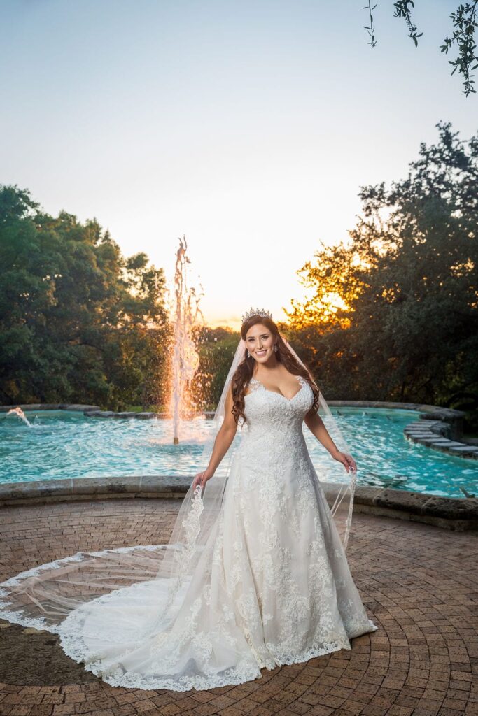 Mary Elizabeth's bridal at the McNay the fountain holding veil
