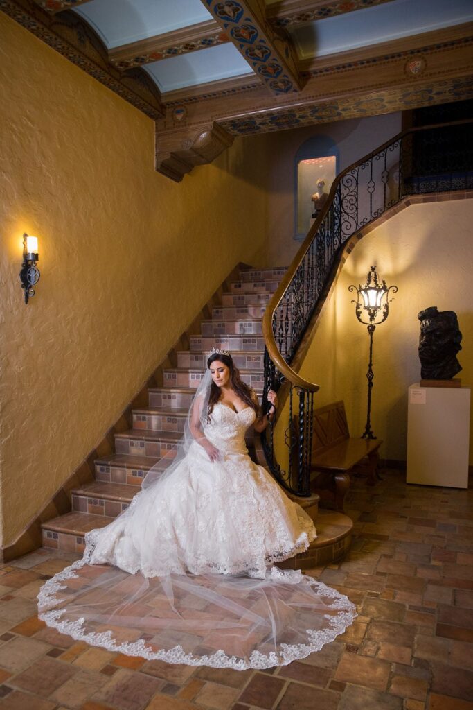Mary Elizabeth's bridal at the McNay inside stair seated looking over