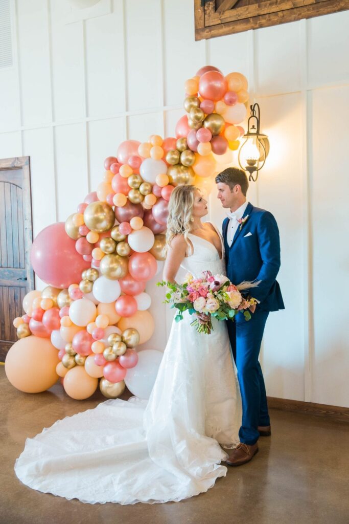 Western Sky Styled shoot bride and groom with balloons romance