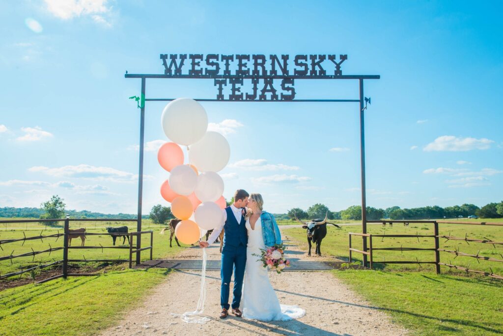 Western Sky Styled shoot couple with cows