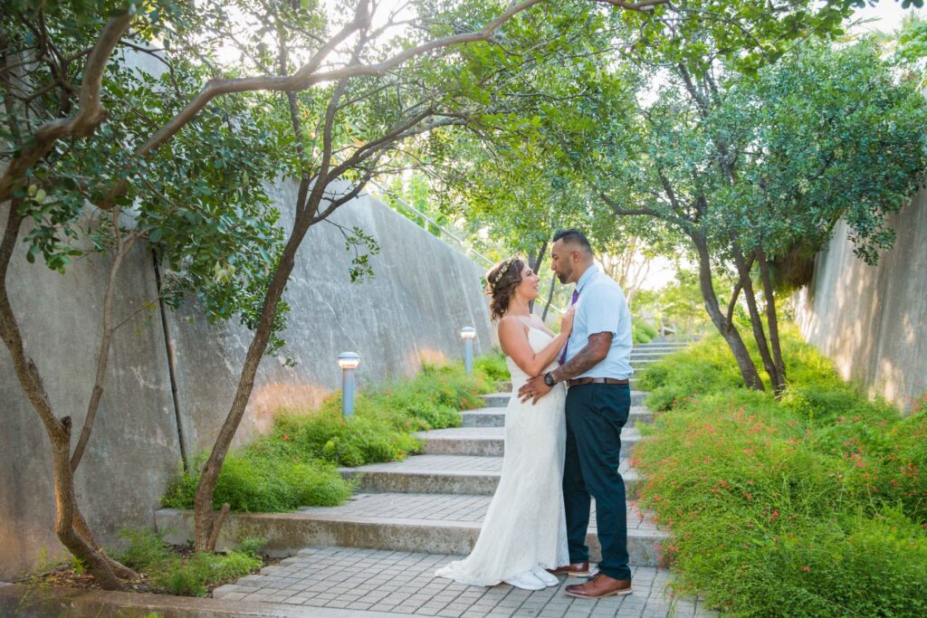 Courtney Amaya wedding San Antonio Botanical Garden couple on the stairs