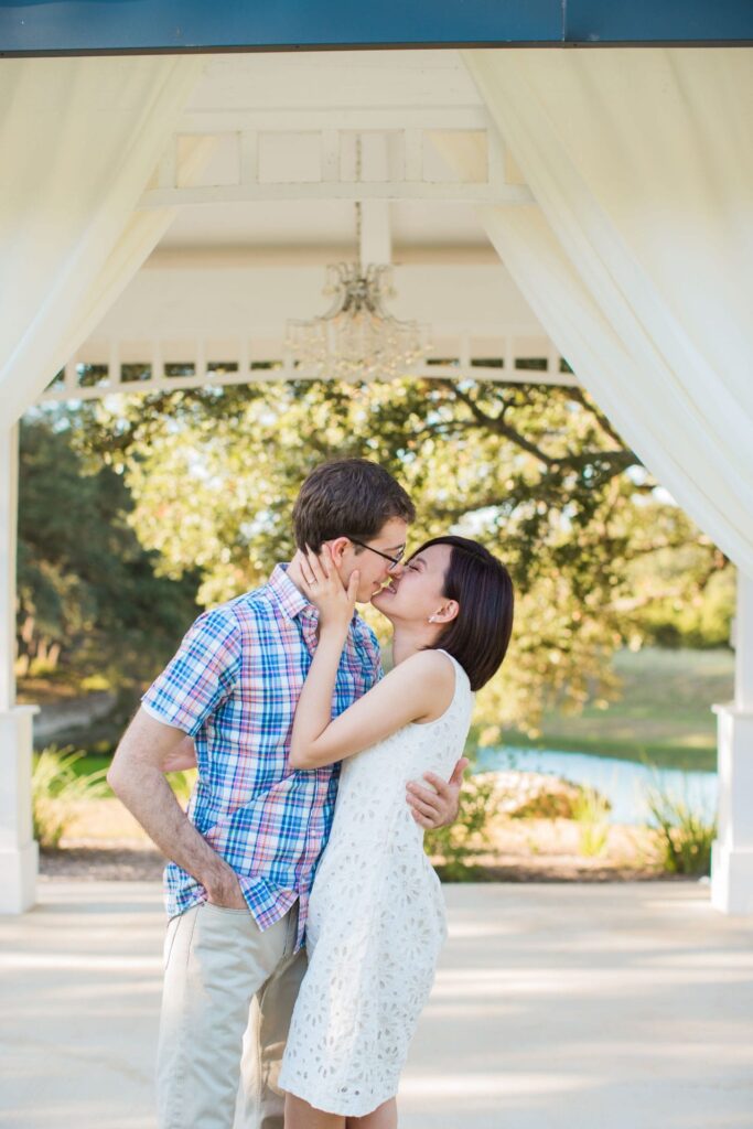 Josh and Tina engagement session at Kendal plantation kiss in the gazebo