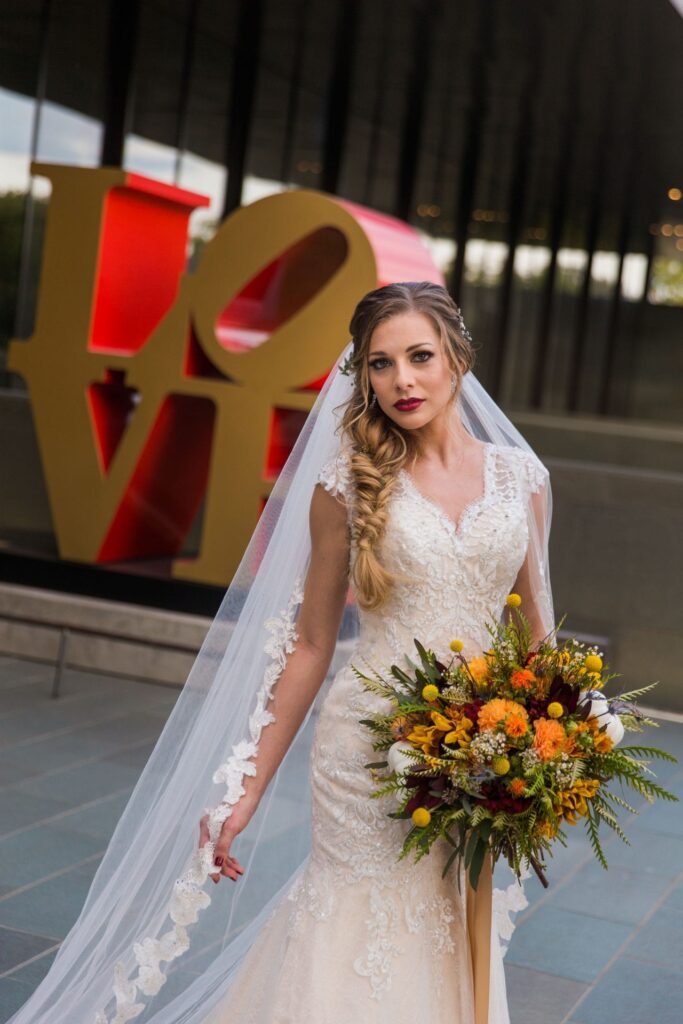 Fall styled shoot at the McNay art museum bride close up at LOVE letters