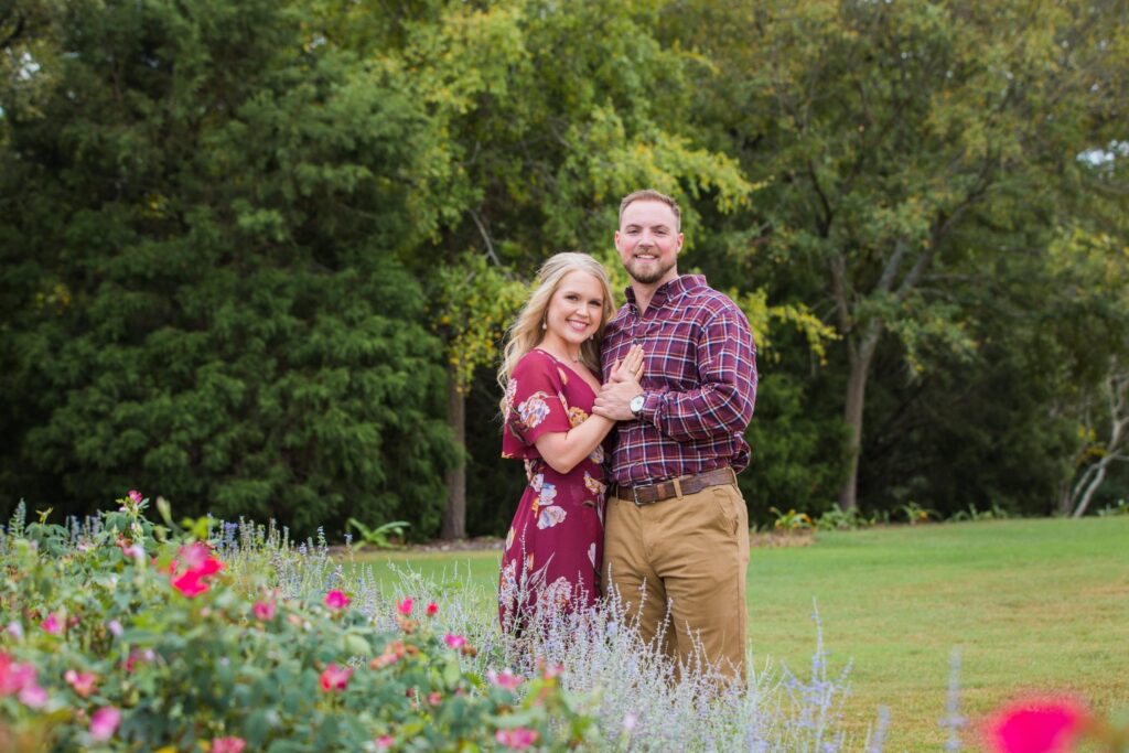 molly engagement Texas a and M behind the flowers