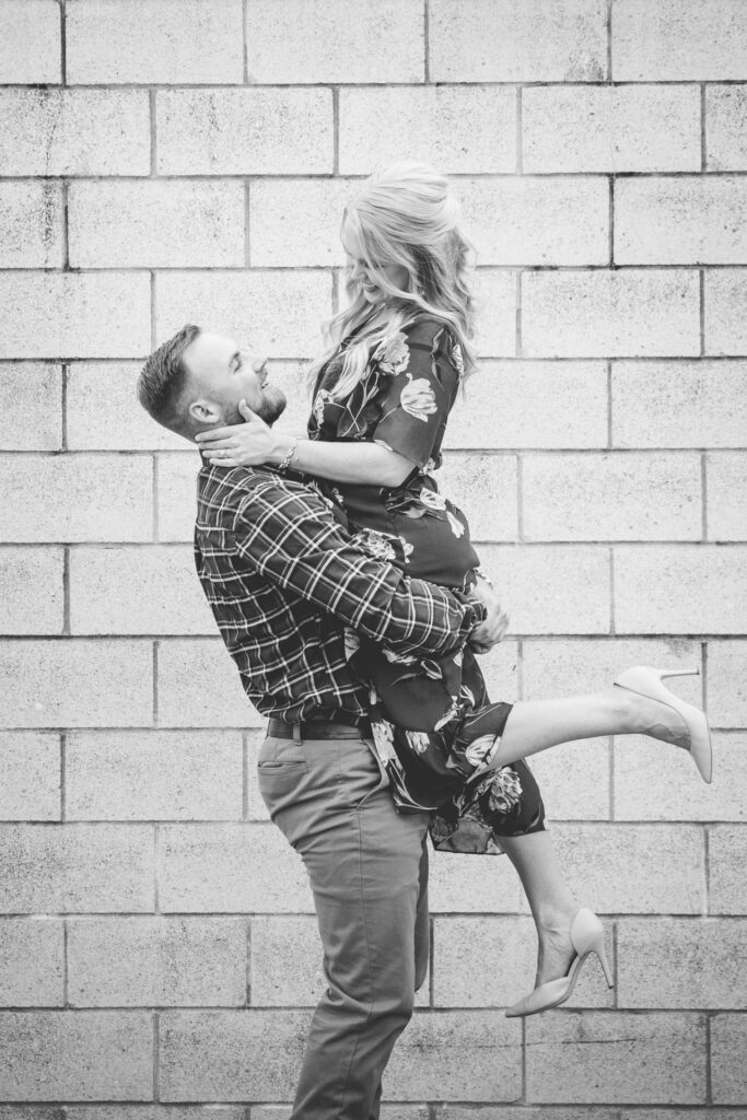 Molly's engagement Texas a and M white white wall black and white