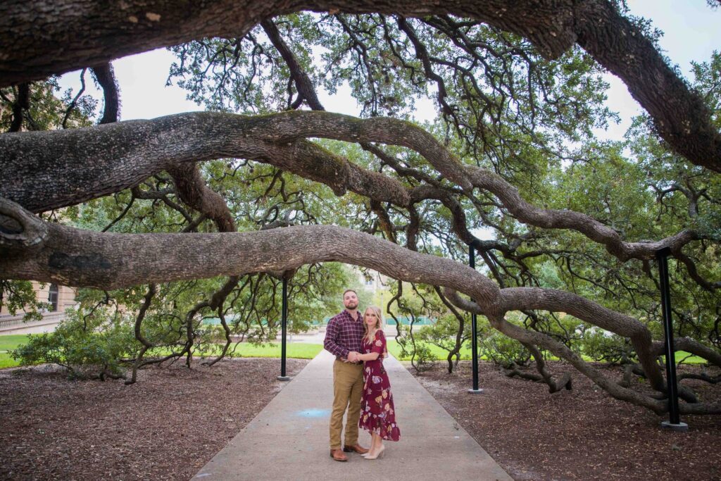 Molly's engagement Texas a and M under the century tree
