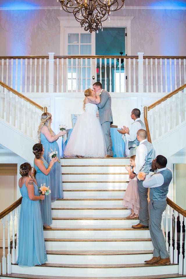Kristina and Brandon's Wedding at Kendall plantation into at top of stairs