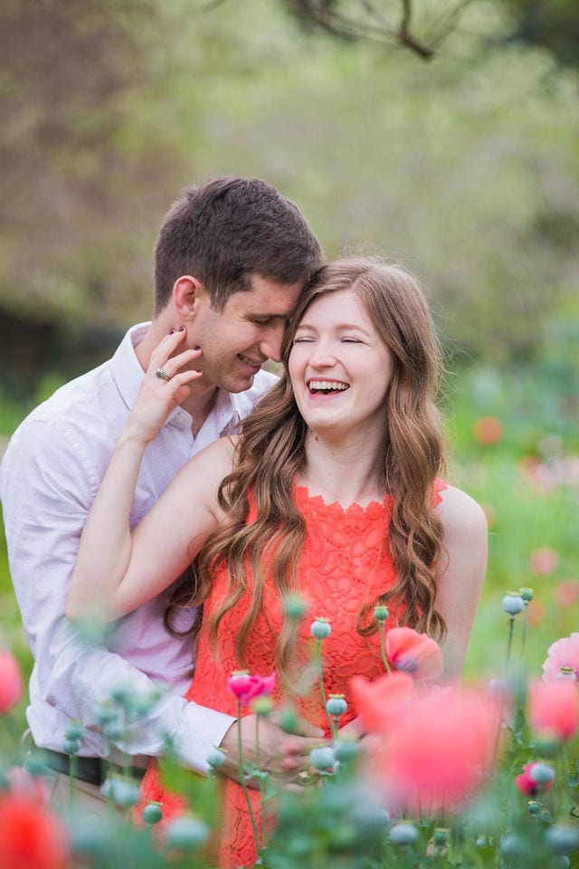Claire & Josh engagement session San Antonio Botanical Gardens poppies laughing