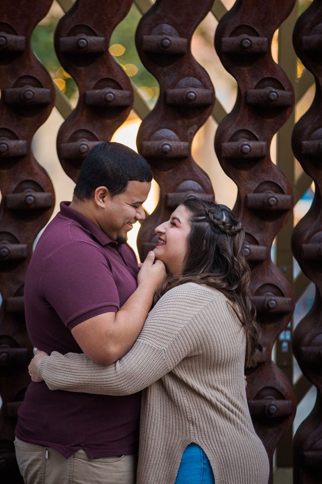 Dana and Andrews engagement session at the Pearl sculpture wall