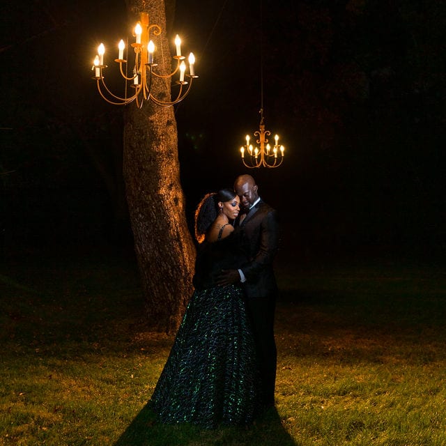 Emerald's engagement at the Lambermont. Couple under the Chandelier