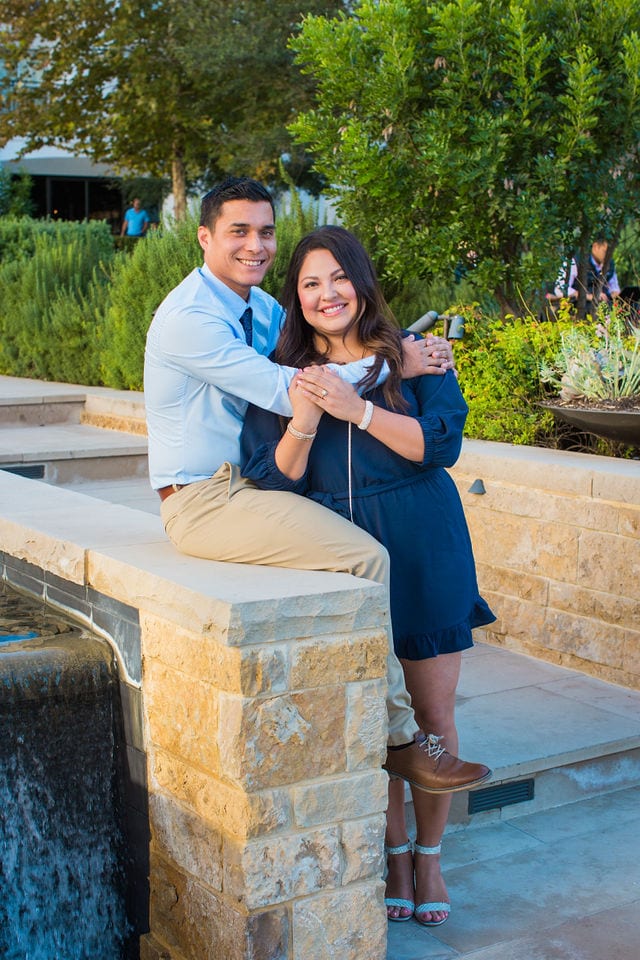 Anthony Engagement session at La Cantera Resort sitting on the wall