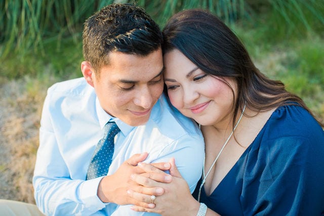 Anthony Engagement session at La Cantera Resort in front of the grass hugging