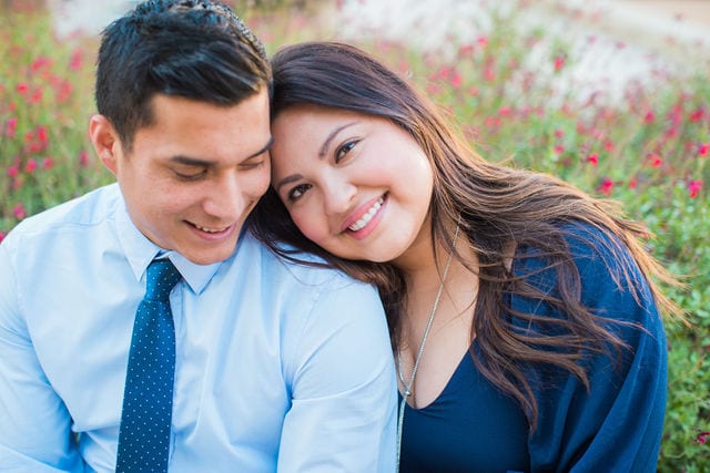 Anthony Engagement session at La Cantera Resort in front of flowers