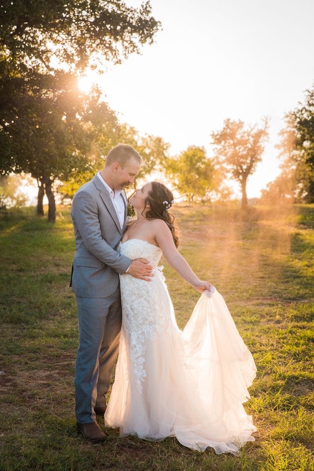 Keely's wedding in Mason TX, couple at sunset with smoke