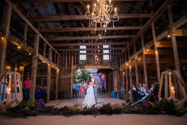 Keely's wedding in Mason TX, first dance barn and chandelier
