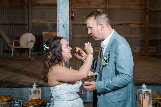 Keely's wedding in Mason TX, cake feeding