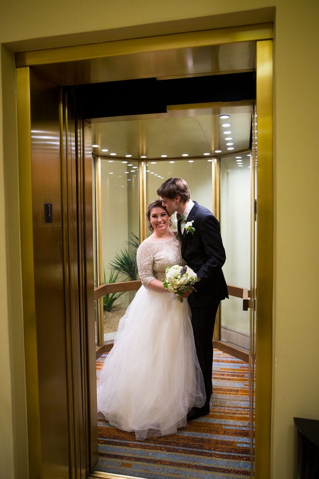 Allison wedding downtown San Antonio Hilton Del Palacio couple in the elevator